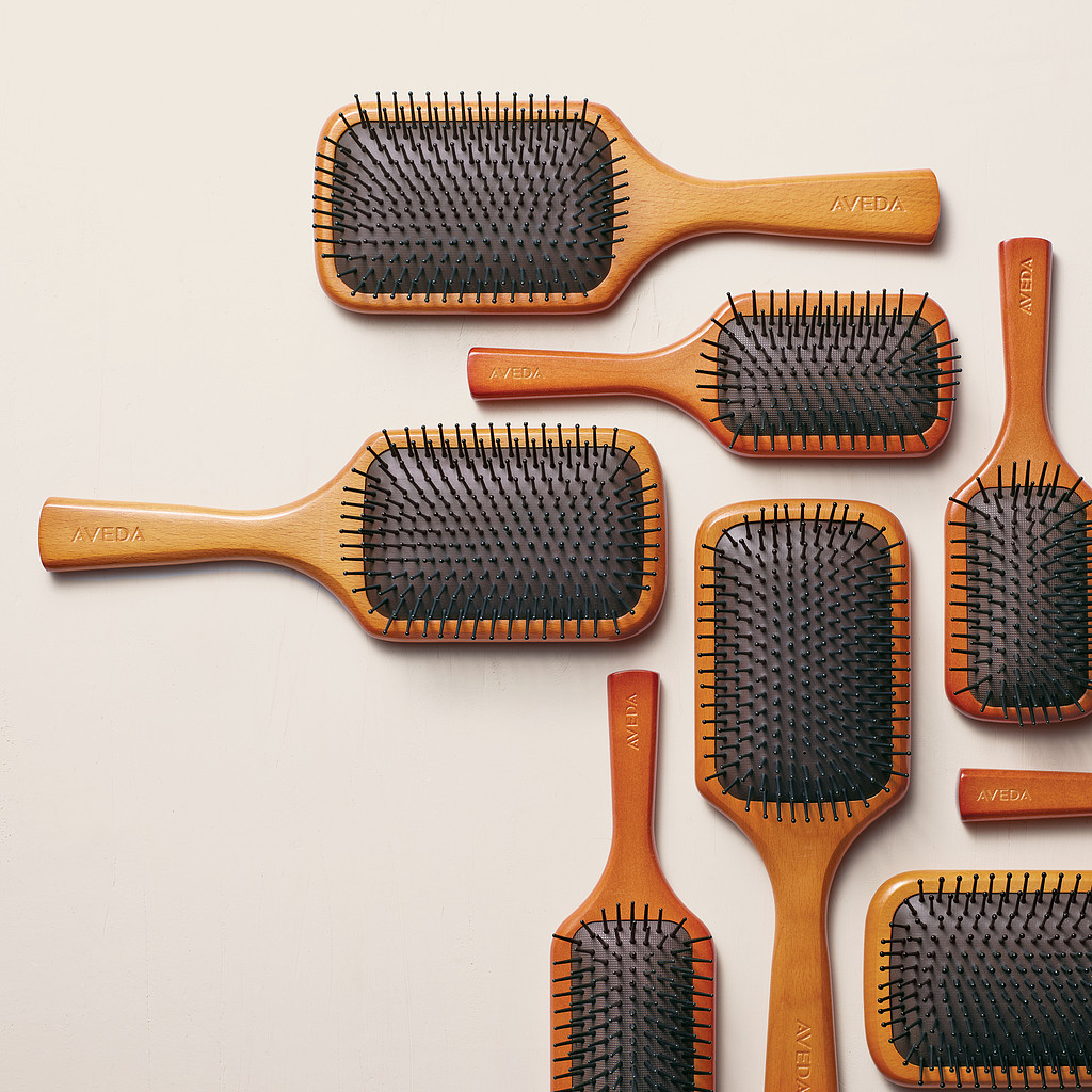 Aveda’s Paddle Brush is our #1 hair staple, always