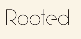 Company logo of Rooted Salon