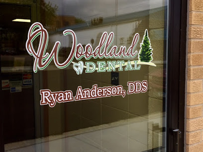 Company logo of Woodland Dental