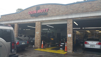 Company logo of Olin Mott Tire Stores